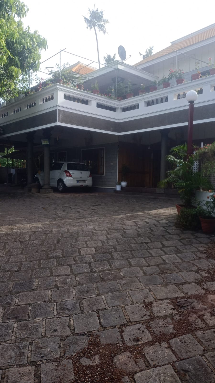 Front view of Molys Homestay entire property with parking and garden